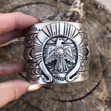 Load image into Gallery viewer, Sterling Silver Navajo Stamped Thunderbird Cuff Made By Rick Enrique