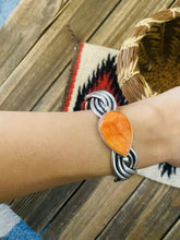 Load image into Gallery viewer, Navajo Orange Spiny &amp; Sterling Silver Braided Cuff Bracelet Signed