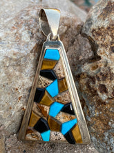 Load image into Gallery viewer, Navajo Rolled Turquoise, Petrified Wood, Onyx &amp; Sterling Silver Pendant